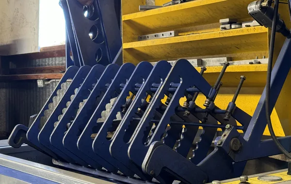 A rack of torque plates used for block honing at RVJ Machine