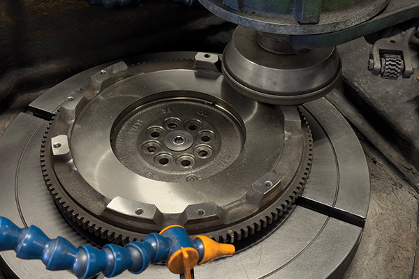 Resurfacing process of a flywheel in progress at RVJ Machine shop